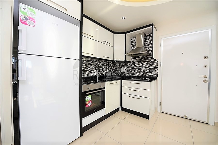 Меблированная квартира с одной спальней в Махмутларе