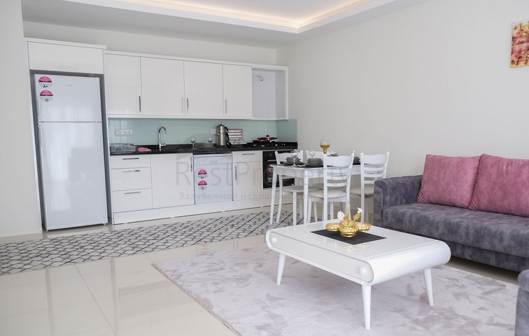 Трехкомнатная квартира с мебелью в Махмутларе