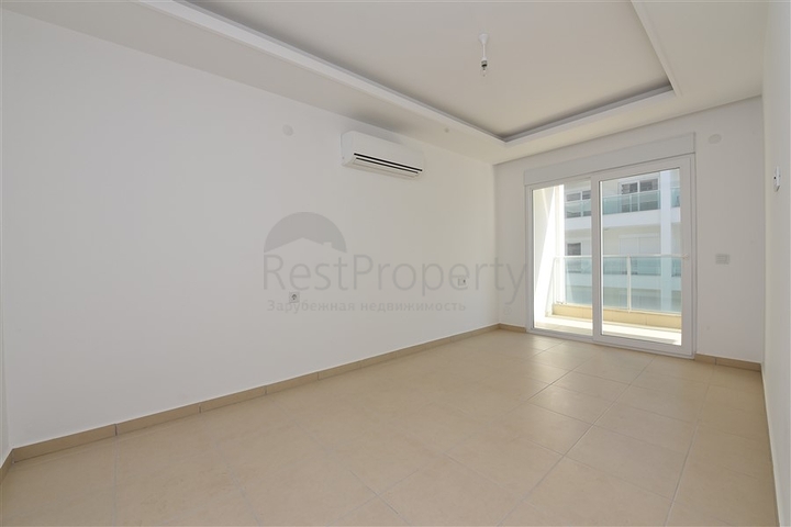 Двухкомнатная квартира в современном комплексе в Авсалларе