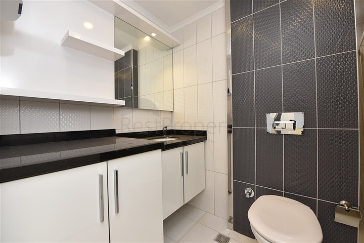 Двухкомнатная квартира в современном комплексе в Авсалларе