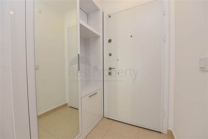 Двухкомнатная квартира в современном комплексе в Авсалларе