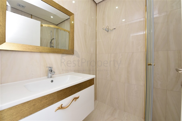 Трехкомнатная квартира в современном комплексе Махмутлара