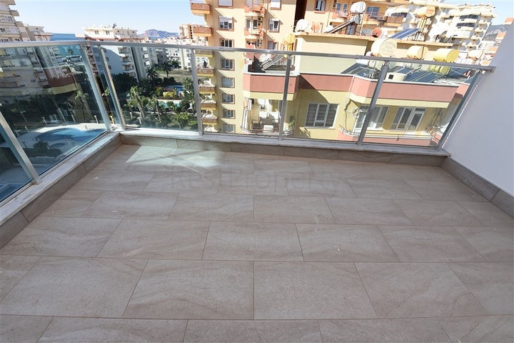 Трехкомнатная квартира в современном комплексе Махмутлара