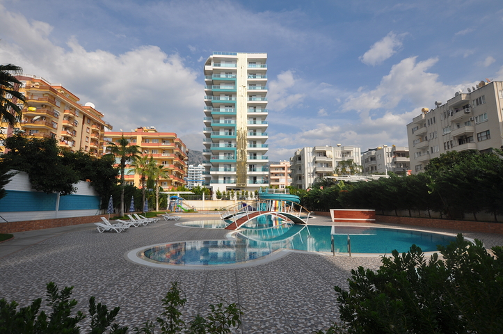 Трехкомнатная квартира в современном комплексе Махмутлара