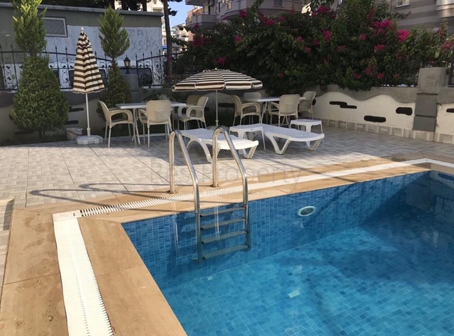 Двухкомнатная квартира с мебелью в районе Махмутлар