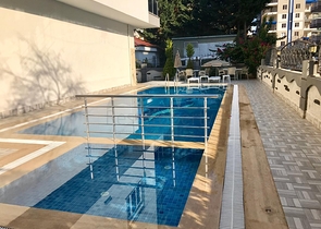 Двухкомнатная квартира с мебелью в районе Махмутлар