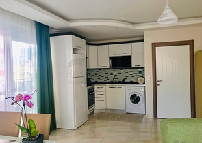 Двухкомнатная квартира с мебелью в районе Махмутлар