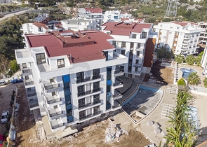 Квартиры1+1 2+1 в новом доме в Хурме Коньяалты Анталья