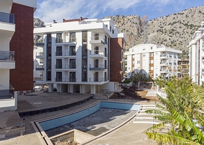 Квартиры1+1 2+1 в новом доме в Хурме Коньяалты Анталья