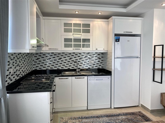 Меблированная квартира в современном комплексе Махмутлара