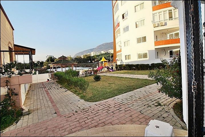 Меблированная квартира планировки 1+1 в районе Махмутлар