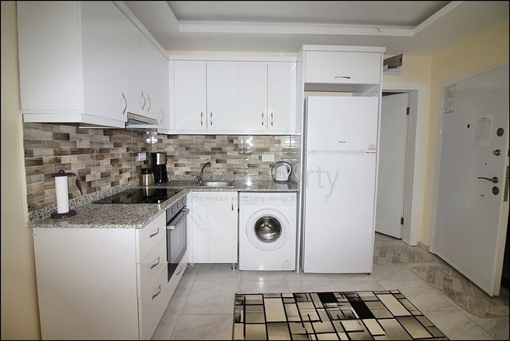 Меблированная квартира планировки 1+1 в районе Махмутлар