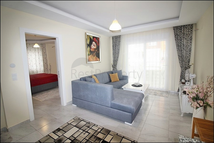 Меблированная квартира планировки 1+1 в районе Махмутлар