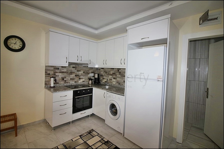 Меблированная квартира планировки 1+1 в районе Махмутлар