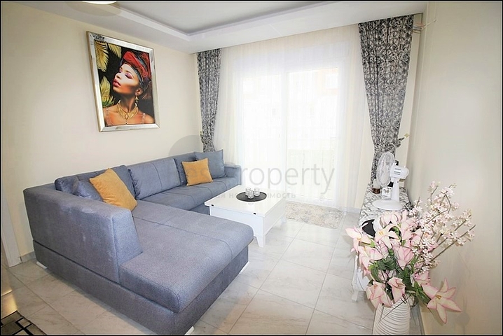 Меблированная квартира планировки 1+1 в районе Махмутлар