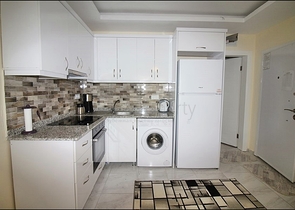 Меблированная квартира планировки 1+1 в районе Махмутлар