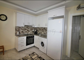 Меблированная квартира планировки 1+1 в районе Махмутлар