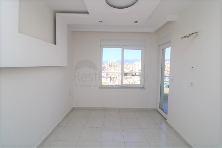 Двухкомнатная квартира с видом на море в районе Махмутлар