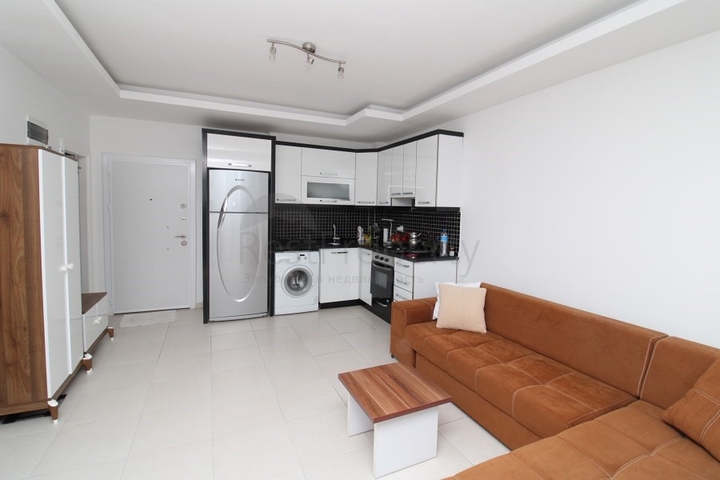 Квартира планировки 1+1 в районе Махмутлар