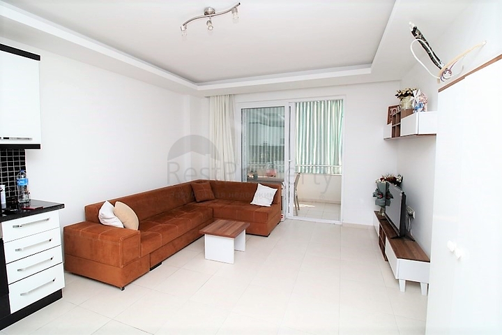 Квартира планировки 1+1 в районе Махмутлар