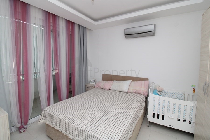 Квартира планировки 1+1 в районе Махмутлар