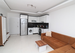 Квартира планировки 1+1 в районе Махмутлар