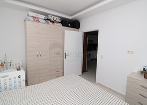 Квартира планировки 1+1 в районе Махмутлар