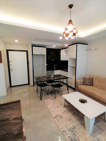 Меблированная квартира с одной спальней в Махмутларе