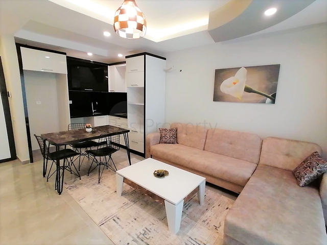 Меблированная квартира с одной спальней в Махмутларе