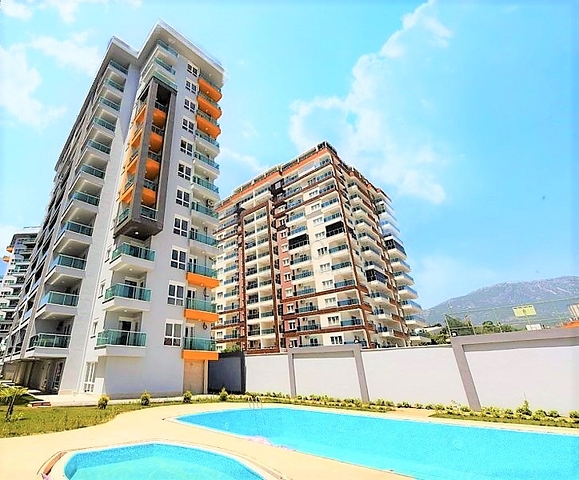 Меблированная квартира с одной спальней в Махмутларе