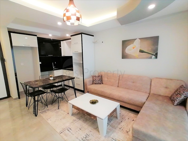 Меблированная квартира с одной спальней в Махмутларе