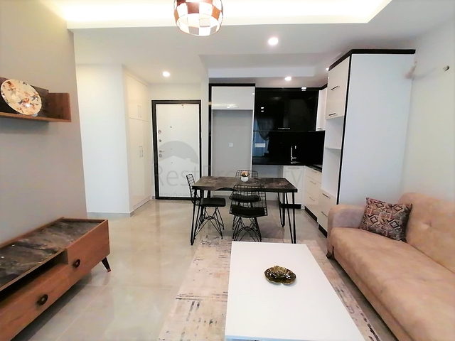 Меблированная квартира с одной спальней в Махмутларе