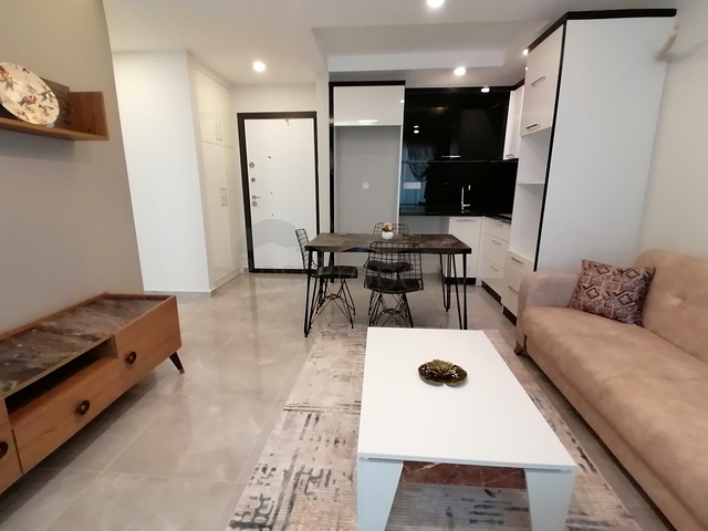 Меблированная квартира с одной спальней в Махмутларе