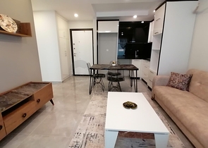 Меблированная квартира с одной спальней в Махмутларе