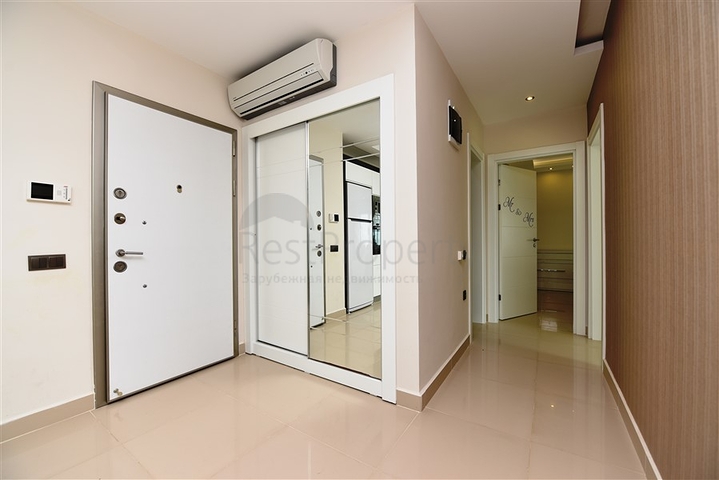 Меблированная квартира с двумя спальными комнатами в районе Каргыджак 