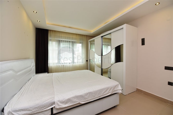 Меблированная квартира с двумя спальными комнатами в районе Каргыджак 