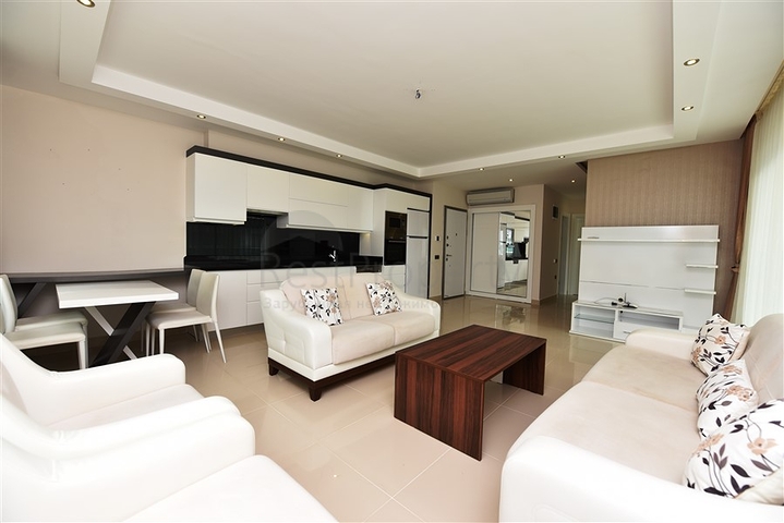 Меблированная квартира с двумя спальными комнатами в районе Каргыджак 