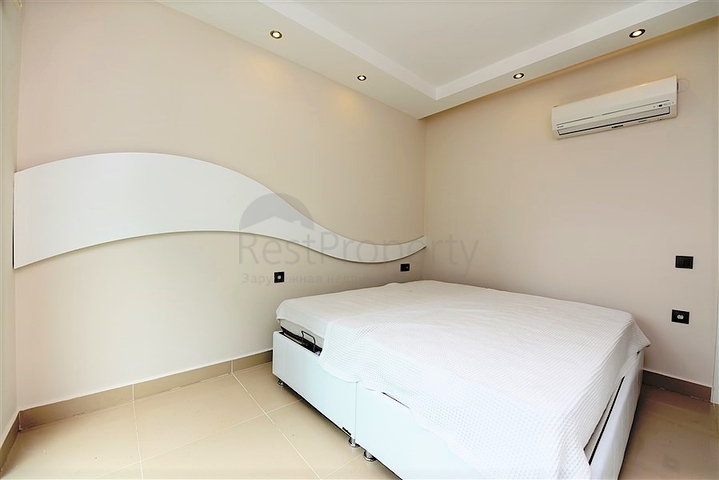 Меблированная квартира с двумя спальными комнатами в районе Каргыджак 