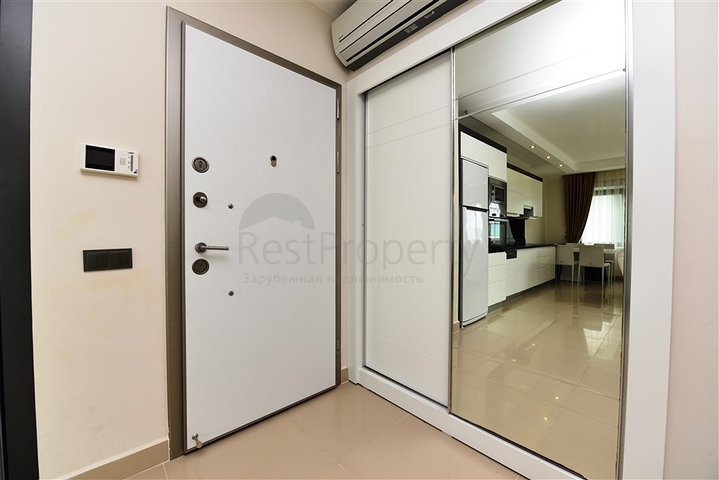 Меблированная квартира с двумя спальными комнатами в районе Каргыджак 