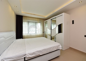 Меблированная квартира с двумя спальными комнатами в районе Каргыджак 