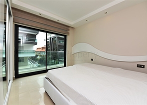 Меблированная квартира с двумя спальными комнатами в районе Каргыджак 