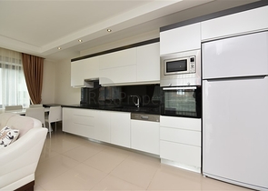 Меблированная квартира с двумя спальными комнатами в районе Каргыджак 