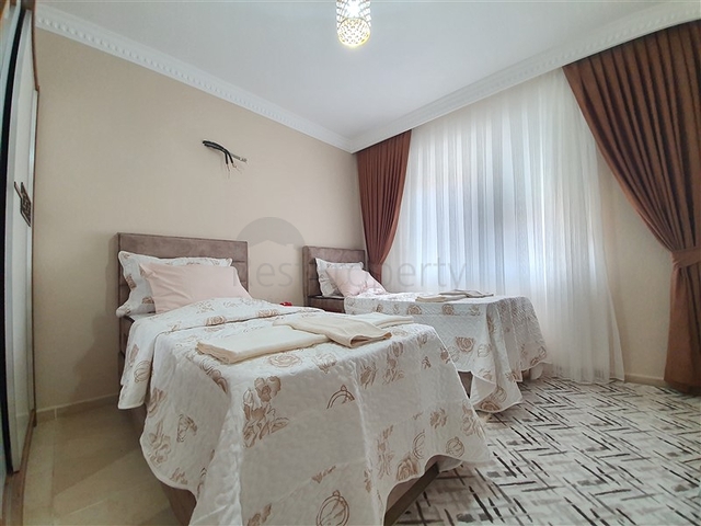 Меблированная квартира с двумя спальнями в Махмутларе