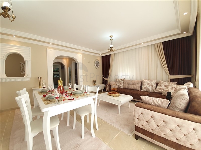 Меблированная квартира с двумя спальнями в Махмутларе