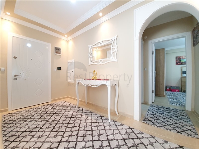 Меблированная квартира с двумя спальнями в Махмутларе