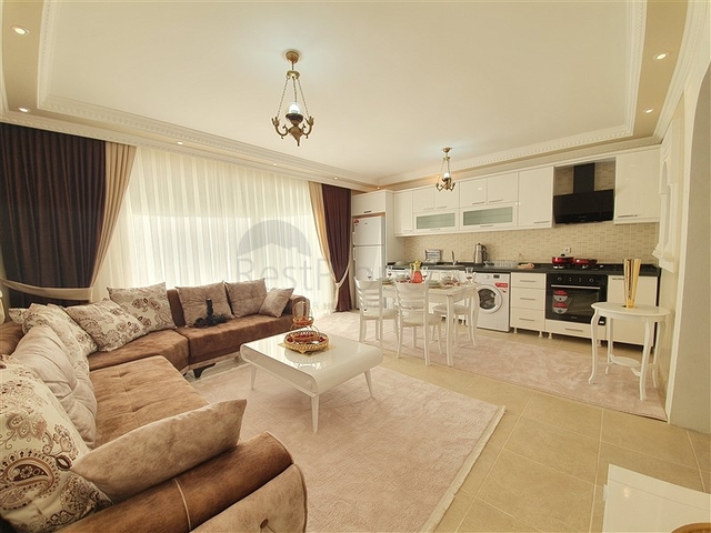 Меблированная квартира с двумя спальнями в Махмутларе