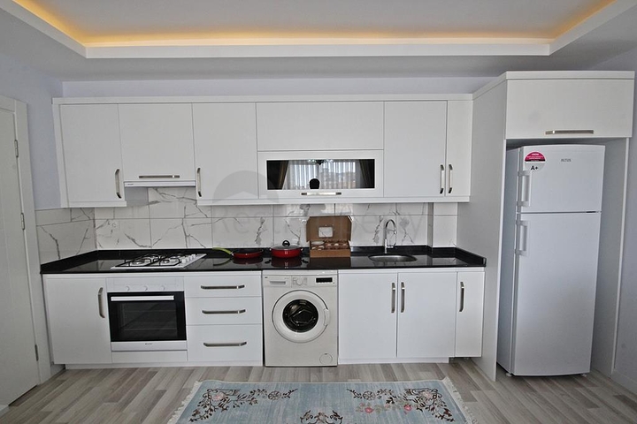 Квартира планировки 1+1 в современном комплексе Махмутлара