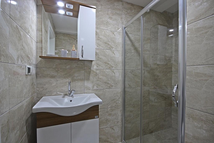 Квартира планировки 1+1 в современном комплексе Махмутлара