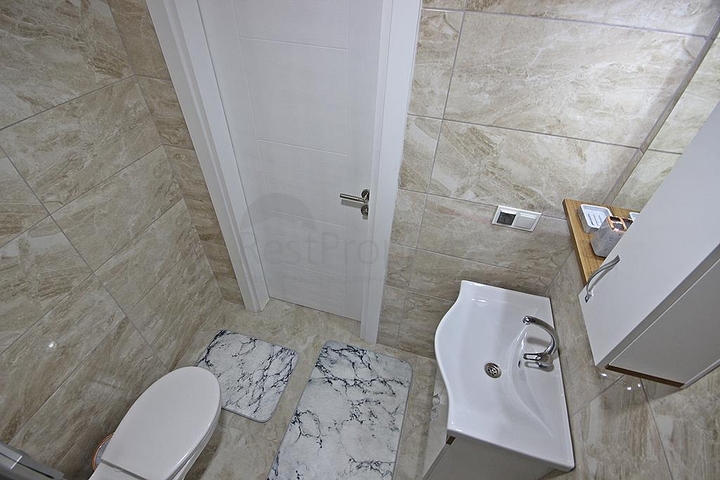 Квартира планировки 1+1 в современном комплексе Махмутлара