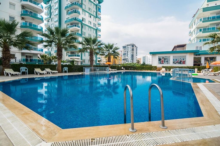 Квартира планировки 1+1 в современном комплексе Махмутлара